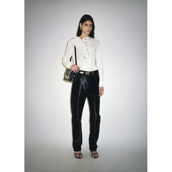 Elevate your elegance in this Khaite Tops   from the 2025 resort wear edit