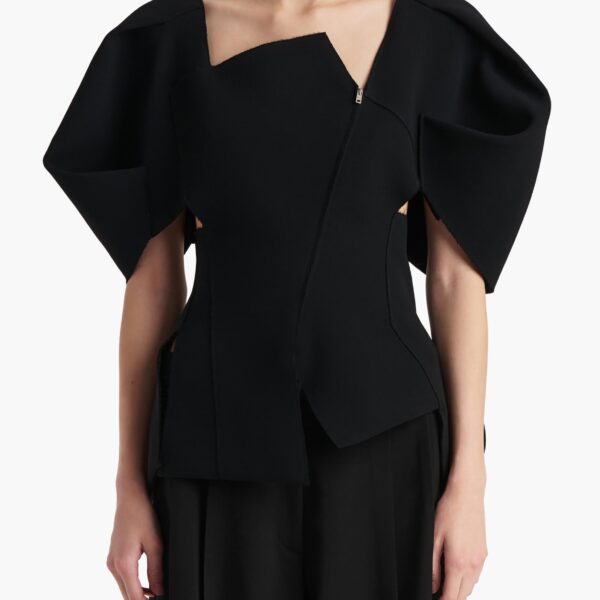 Elevate your elegance in this Khaite Tops   from the 2025 resort wear edit