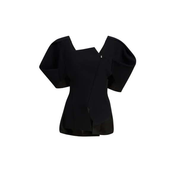 Elevate your elegance in this Khaite Tops   from the 2025 resort wear edit