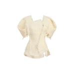 Elevate your elegance in this Khaite Tops   from the 2025 resort wear edit