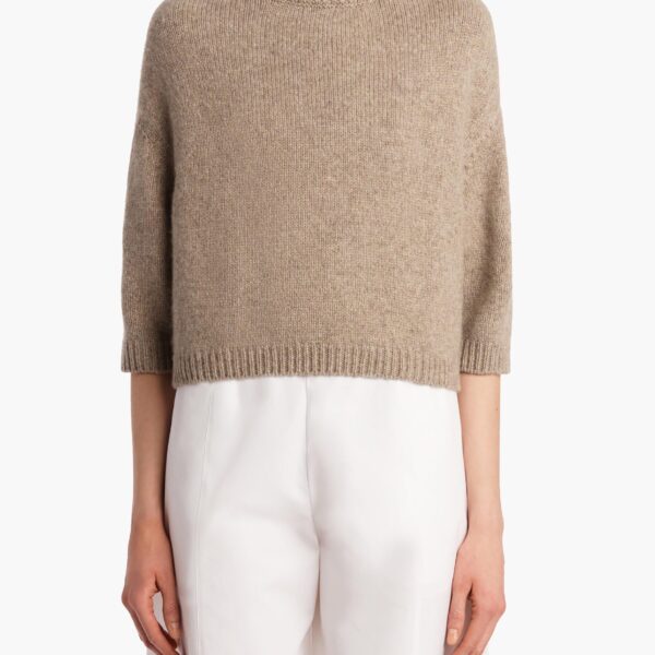 Elevate your elegance in this Khaite Knitwear   from the 2025 resort wear edit