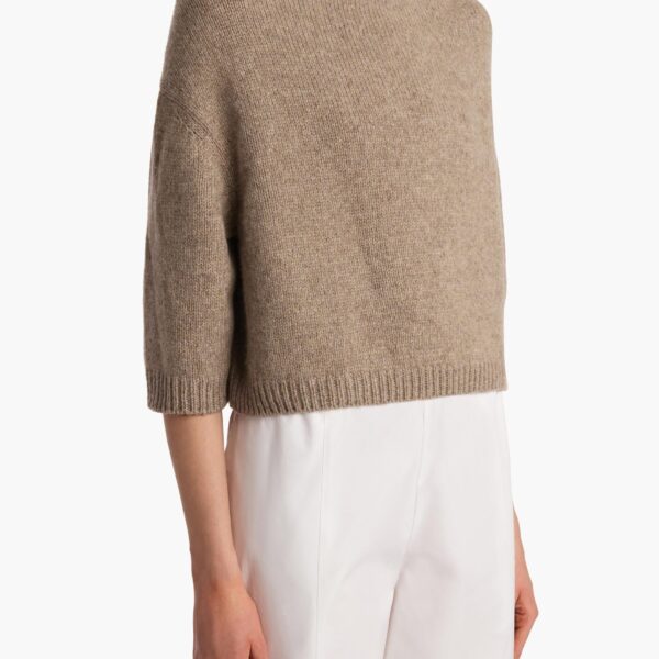 Elevate your elegance in this Khaite Knitwear   from the 2025 resort wear edit