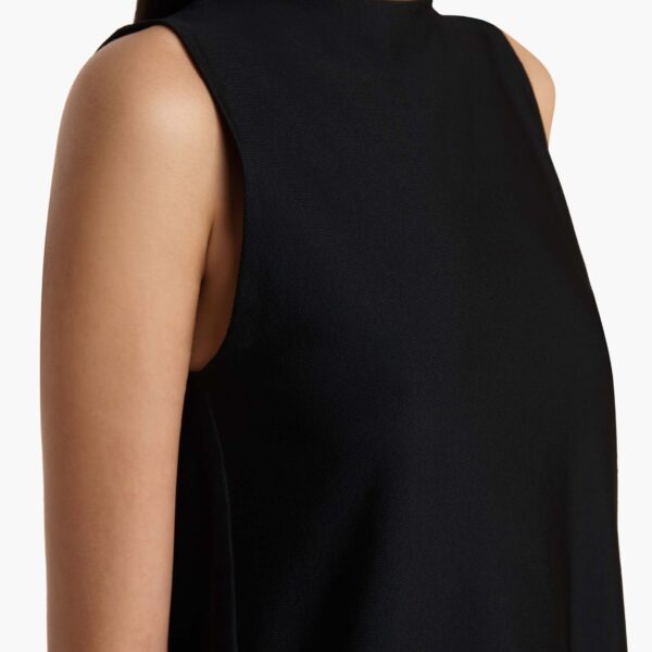 Elevate your elegance in this Khaite Tops   from the 2025 resort wear edit