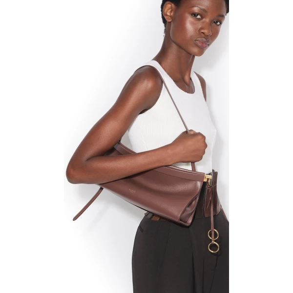 Alaïa Le Click East West Medium Bag In Calfskin - Alaia Bags - Laser Cut Luxury - Shop at Coveti