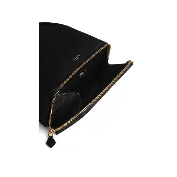 Alaïa Le Pochon Bag In Suede - Alaia Bags - Laser Cut Luxury - Shop at Coveti