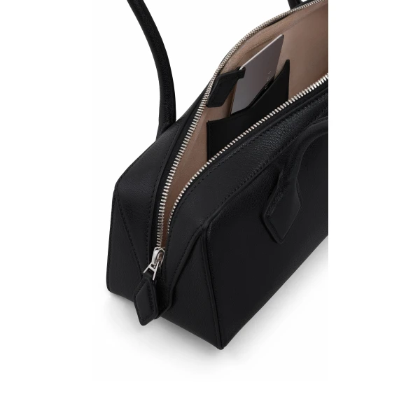 Alaïa Le Teckel Medium Bag In Goatskin - Alaia Bags - Laser Cut Luxury - Shop at Coveti