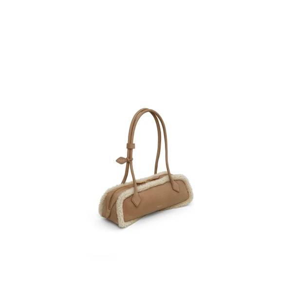 Alaïa Le Teckel Medium Bag In Merino Shearling - Alaia Bags - Laser Cut Luxury - Shop at Coveti