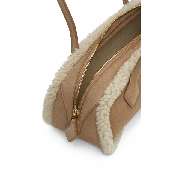 Alaïa Le Teckel Medium Bag In Merino Shearling - Alaia Bags - Laser Cut Luxury - Shop at Coveti