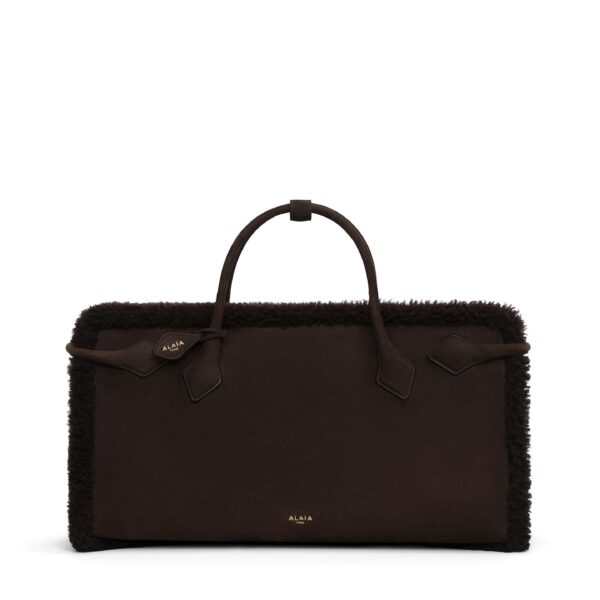 Alaïa Le Teckel Tote Bag In Merino Shearling - Alaia Bags - Laser Cut Luxury - Shop at Coveti