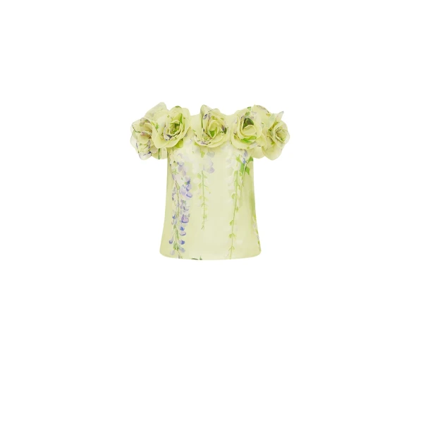 Leo Lin Green Tops A cascading lilac dream! These beautiful lilac wisteria blooms tumble down a soft lime canvas. This print evokes pure fresh air