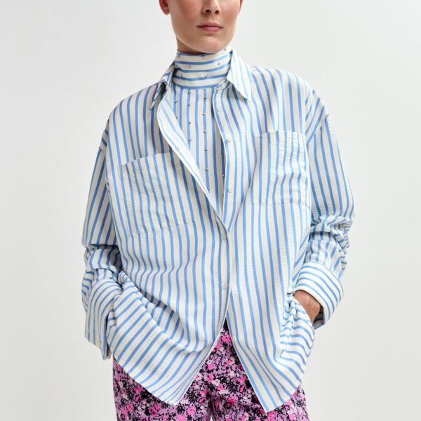 Essentiel Antwerp Light blue and off-white oversized shirt with rhinestone embellishments and layered bib - Essentiel Antwerp Shirts - Colorful Belgian Design - Shop at Coveti