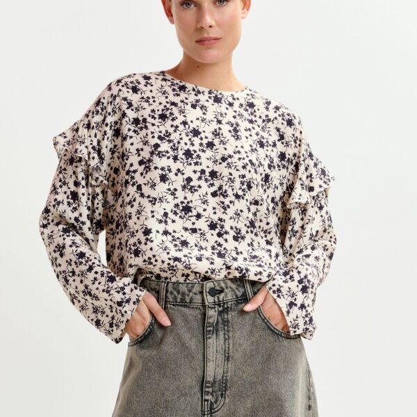 Essentiel Antwerp Off-white and black floral top with ruffle detail - Essentiel Antwerp Tops - Colorful Belgian Design - Shop at Coveti