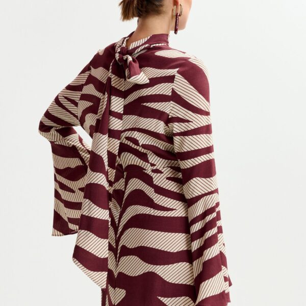 Essentiel Antwerp Off-white and burgundy asymmetric zebraprint maxi dress with pussy bow tie - Essentiel Antwerp Dresses - Colorful Belgian Design - Shop at Coveti