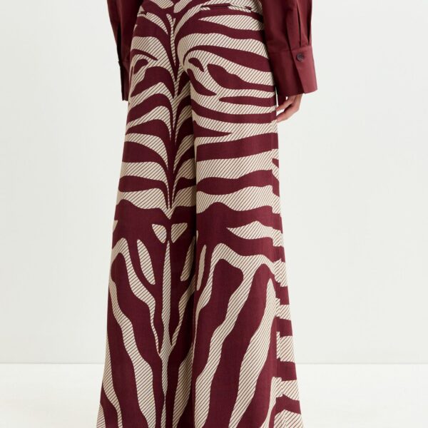 Essentiel Antwerp Off-white and burgundy zebra-print wide-leg pants - Essentiel Antwerp Pants - Colorful Belgian Design - Shop at Coveti