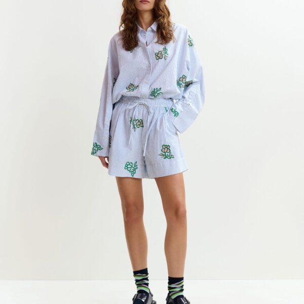 Essentiel Antwerp Off-white cotton mini shorts with light blue pinstriped embroidered with sequin and bead embellishments - Essentiel Antwerp Shorts - Colorful Belgian Design - Shop at Coveti