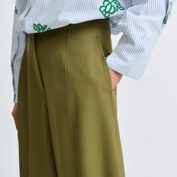 Essentiel Antwerp Olive green barrel-leg pants with twisted side seams - Essentiel Antwerp Pants - Colorful Belgian Design - Shop at Coveti