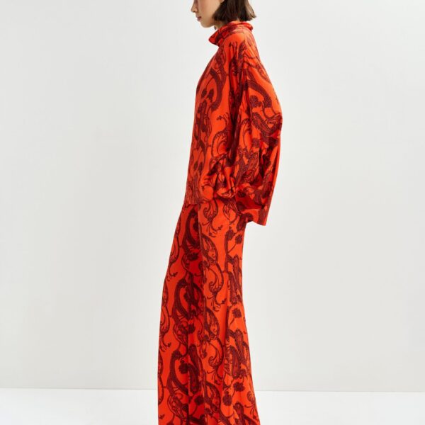 Essentiel Antwerp Orange and black paisley-print flared pants - Essentiel Antwerp Pants - Colorful Belgian Design - Shop at Coveti