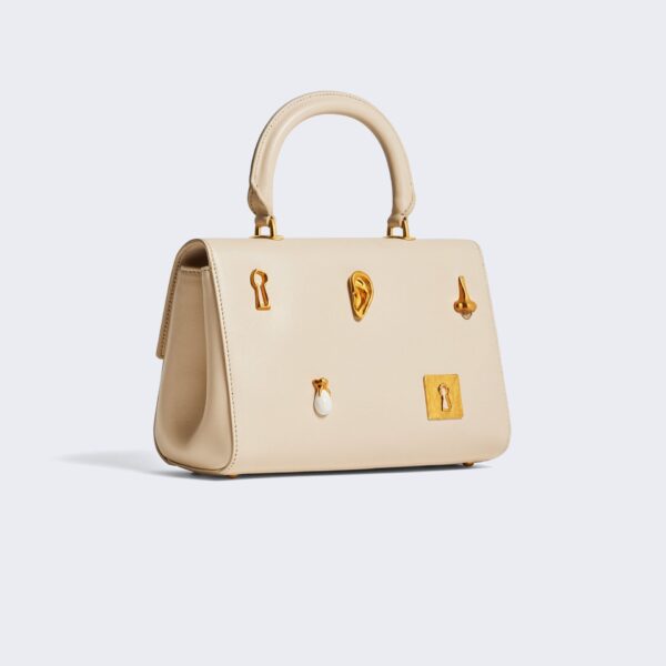 Schiaparelli nose bag