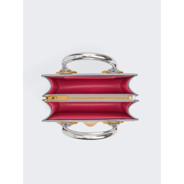 Schiaparelli nose bag