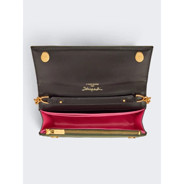 Schiaparelli nose bag