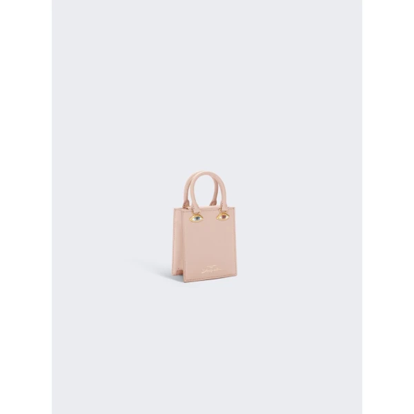 Schiaparelli nose bag