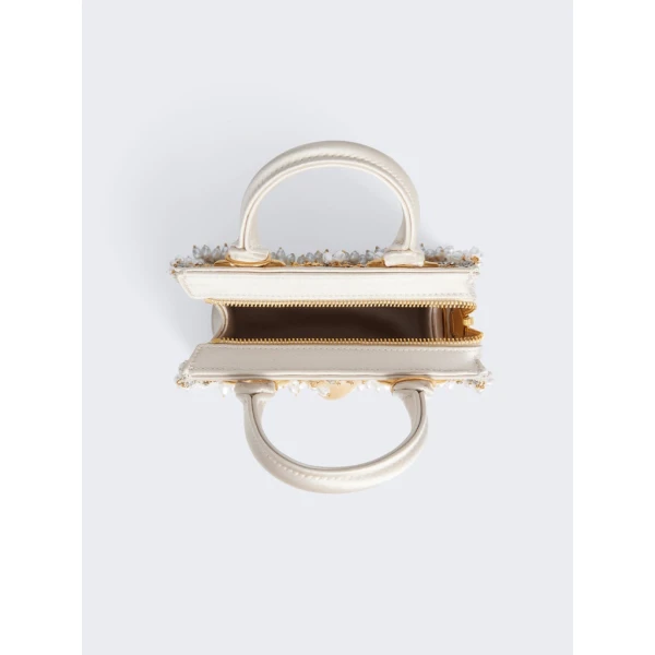 Schiaparelli nose bag