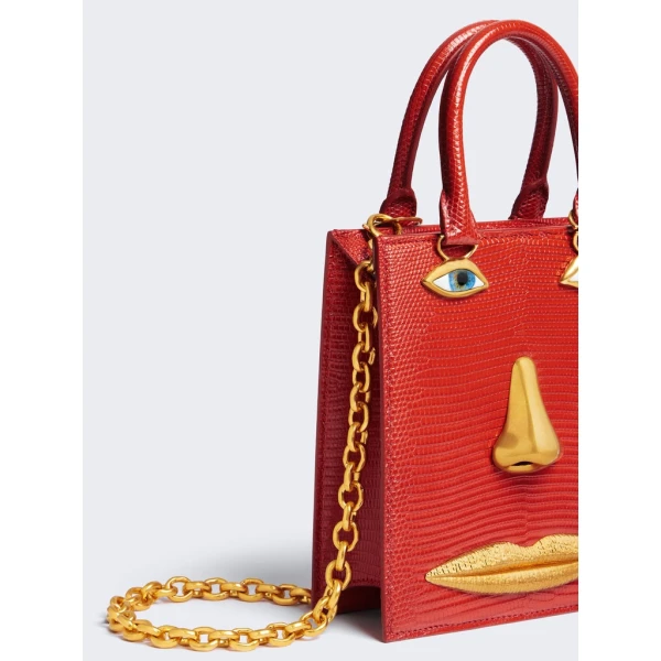 Schiaparelli nose bag