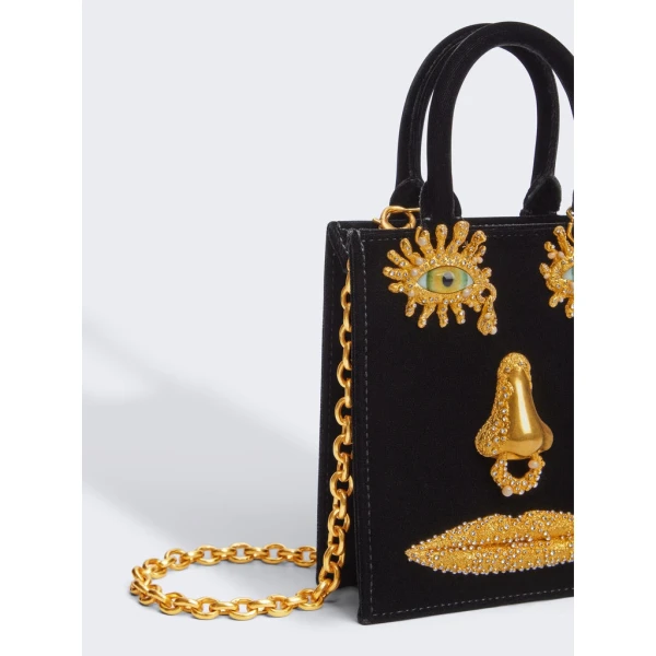 Schiaparelli nose bag