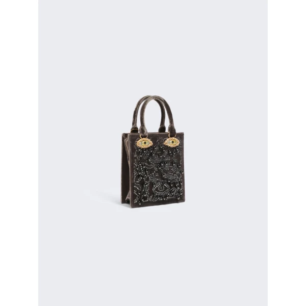 Schiaparelli nose bag