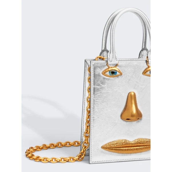 Schiaparelli nose bag