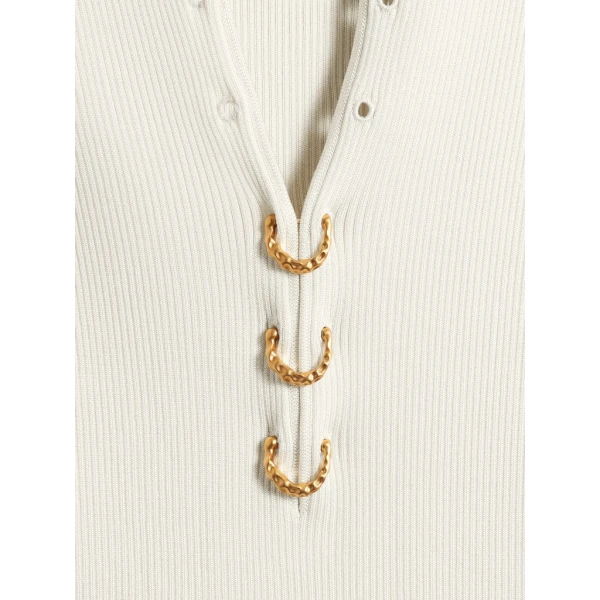 Schiaparelli Piercings Polo Tops in Schiaparelli Authentic Luxury Fashion at Coveti