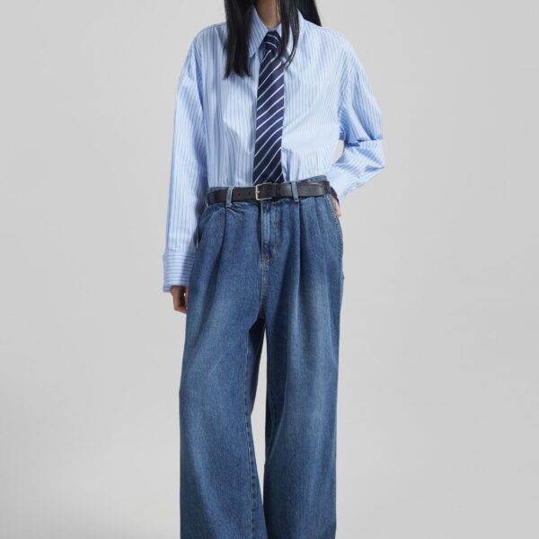 The Frankie Shop Buxton Pleated Wide Jeans - Medium Wash - Oversized Minimalist Pants in Blue - Shop at Coveti