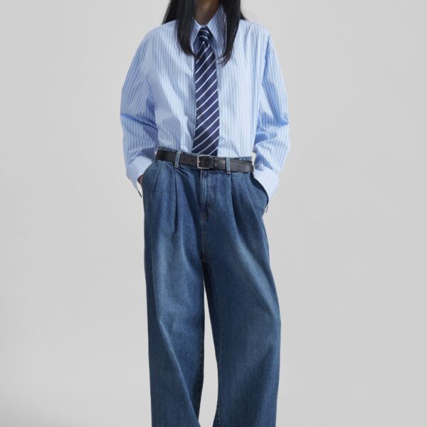 The Frankie Shop Buxton Pleated Wide Jeans - Medium Wash - Oversized Minimalist Pants in Blue - Shop at Coveti