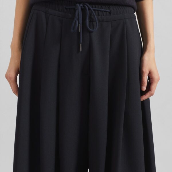 The Frankie Shop Corlen Pleated Wide Pants - Dark Navy - Oversized Minimalist Pants in Blue - Shop at Coveti