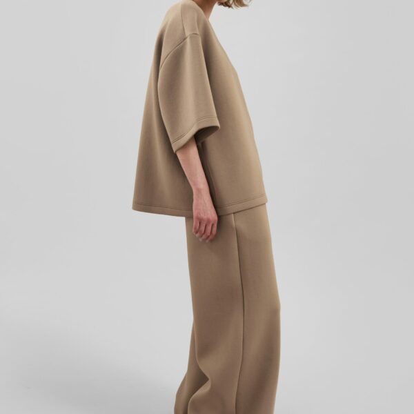 The Frankie Shop Mirca Neoprene Elastic Pants - Camel - Oversized Minimalist Pants in Brown - Shop at Coveti