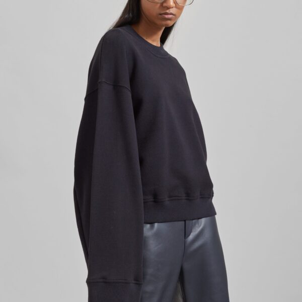 The Frankie Shop Talia Sweatshirt - Black - Oversized Minimalist Tops in Black - Shop at Coveti