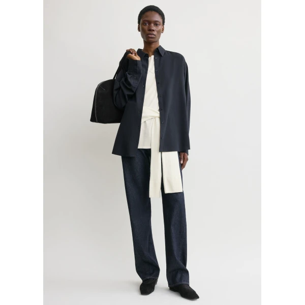 Toteme Tops with minimalist design at Coveti