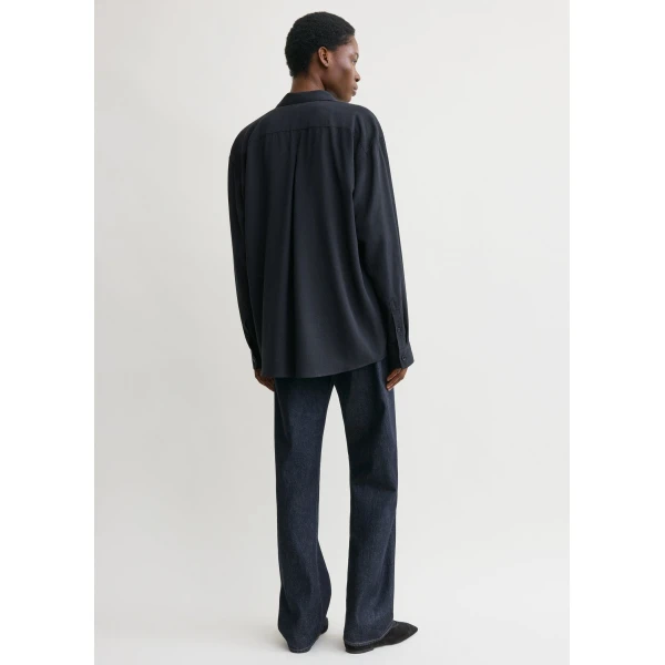 Toteme Tops with minimalist design at Coveti