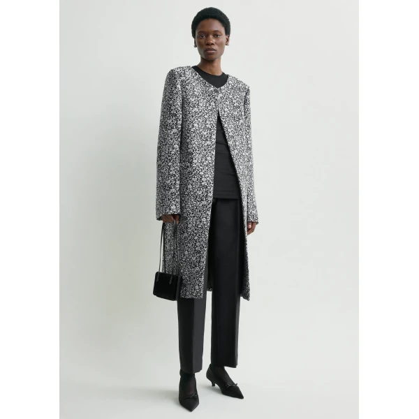 Toteme Coats with minimalist design at Coveti