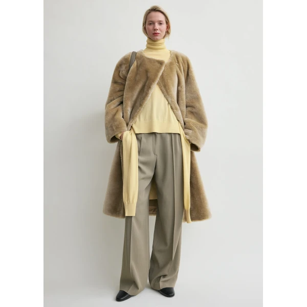 Toteme Coats with minimalist design at Coveti