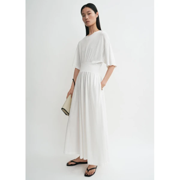 Toteme Dresses with minimalist design at Coveti