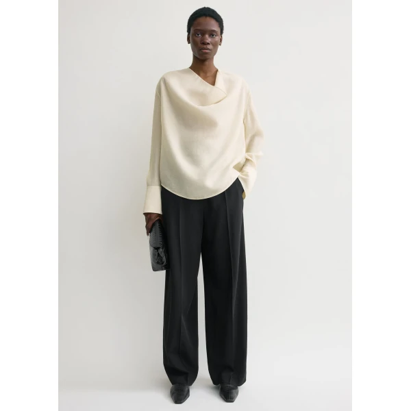 Toteme Tops with minimalist design at Coveti