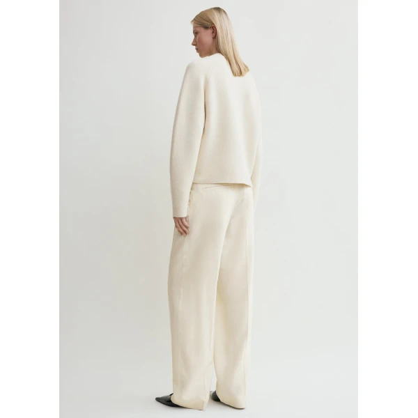 Toteme Knitwear with minimalist design at Coveti