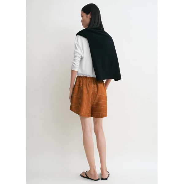 Toteme Shorts with minimalist design at Coveti