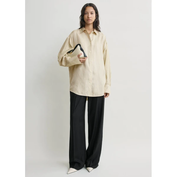 Toteme Tops with minimalist design at Coveti