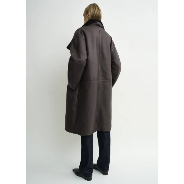 Toteme Coats with minimalist design at Coveti