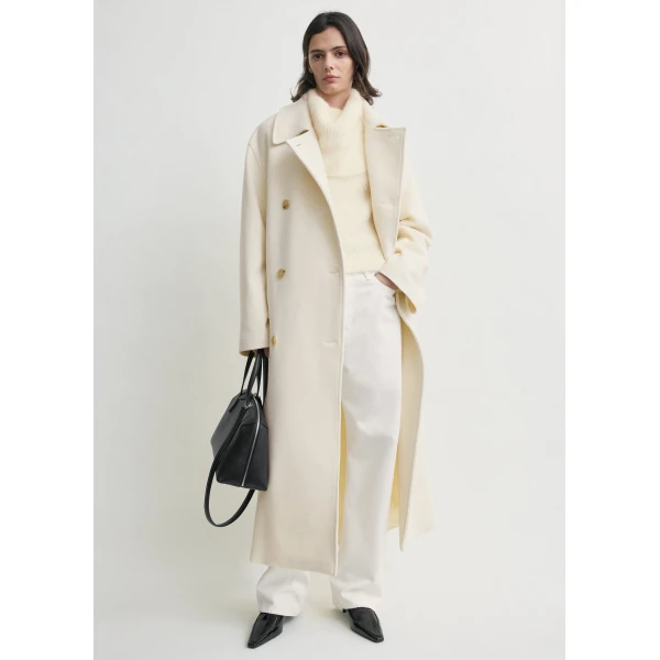 Toteme Coats with minimalist design at Coveti