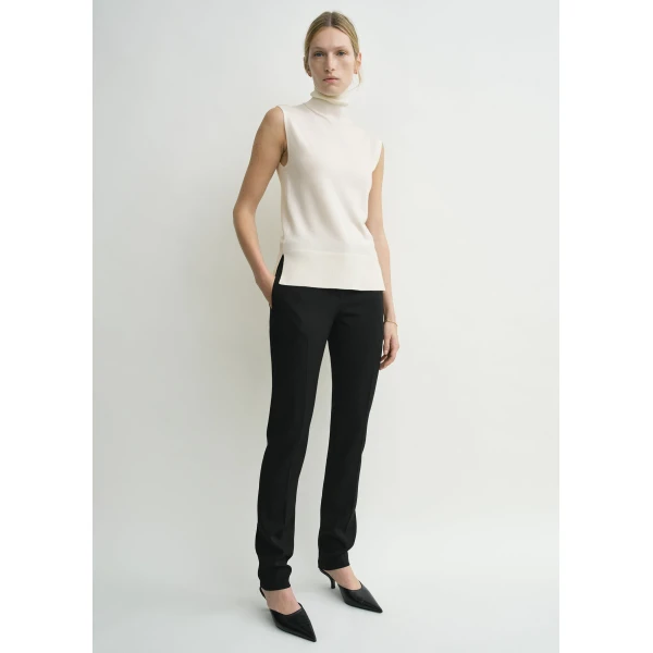 Toteme Knitwear with minimalist design at Coveti