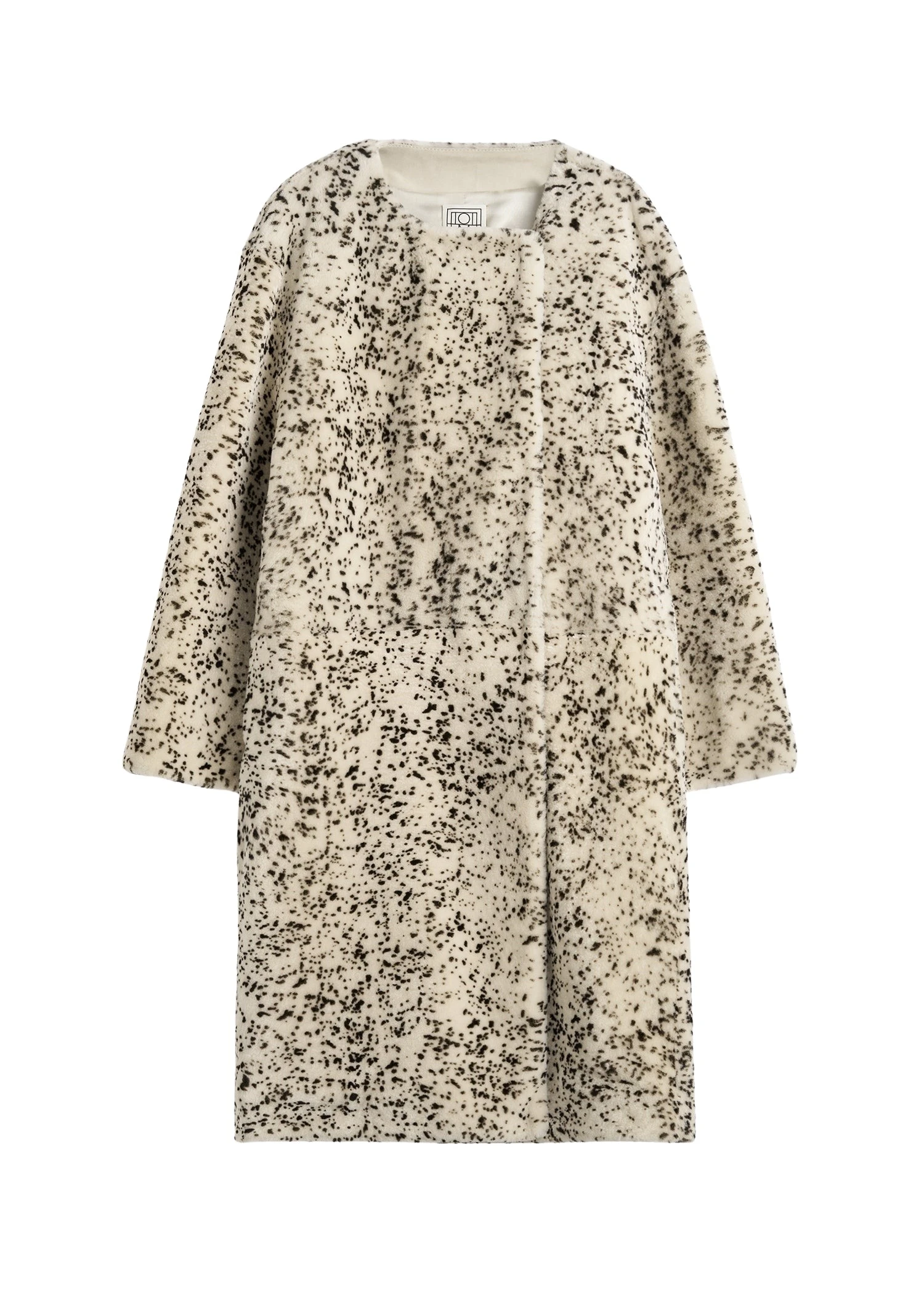Toteme-Stracciatella-shearling-coat-blackwhite97026_nobg Toteme Coats with minimalist design at Coveti