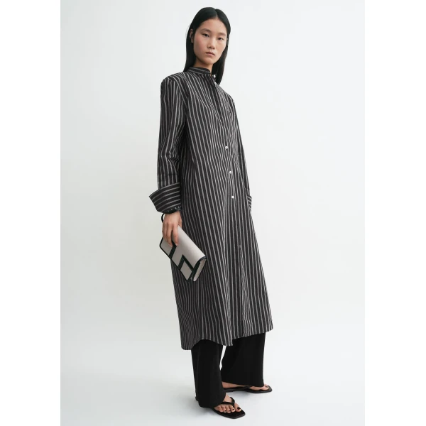 Toteme Dresses with minimalist design at Coveti